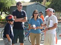 DSCN3048  Braille stoker Ricardo gets tips from his tandem captain Ryan, Braille coordinator Regina and Dave