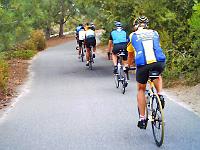 56bikepath07  Ben(wearing classic NCCC Jersey) follows riders along Hwy. 56 bike path as it winds toward Poway.