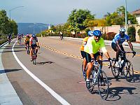 56bikepath08  Dan and Sam lead riders up newly opened road northward off the bike path.